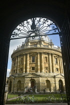 England, Oxford, Bodleian Library, Radcliffe Camera through ironwork entrance.
