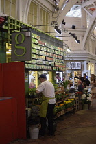 England, Oxford, Covered Market, florist and stalls.