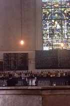 England, Oxford, Freud bar/nightclub, interior of bar with old stained glass window..