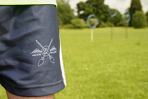 England, Oxford, University Parks, Quidditch team practice, detail of Oxford University Quidditch logo.