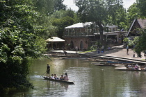England, Oxford, University Parks, River Cherwell and the boathouse with punts.