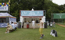 Food, Catering, Vegan food stall at outdoor festival.