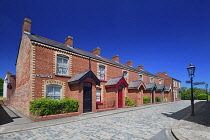 Ireland, County Down, Cultra, Ulster Folk and Transport Museum, Row of red brick terraced houses called Cluan Place.