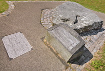 Ireland, County Down, Downpatrick, Mourne granite slab marking the traditional burial place of St Patrick at the Cathedral Church of the Holy Trinity also known as Down Cathedral.