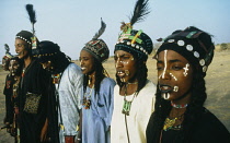 Nigeria, General, Wodaabe men with painted faces.