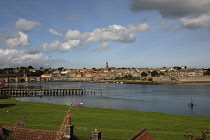 England, Northumberland, Berwick on Tweed, View across river with the town skyline beyond.