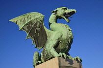 Slovenia, Ljubljana, Dragon Bridge, One of the dragon statues.