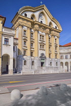 Slovenia, Ljubljana, Angular view of the Ursuline Church of the Holy Trinity in Kongresni Trg or Congress Square.