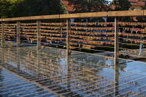 Slovenia, Ljubljana, Butchers Bridge over the Ljubljanica River with many love locks on its railings.