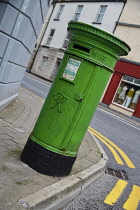 Ireland, County Roscommon, Boyle, Victorian post box with the Victorian royal cypher and the manufacturers name A Handyside and Co. Ltd Derby and London written around the base.