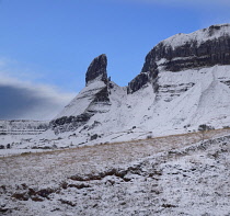 Ireland, County Leitrim, Eagles Rock in winter with snowfall and Truskmore Mountain on right.