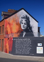 Ireland, County Sligo, Sligo town, Wall mural of Maud Gonne by the artist Nick Purdy with a poem by W B yeats titled When you are old.