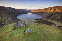 Ireland, County Wicklow, Early morning view of the Wicklow Mountains and Lough Tay including the Luggala Estate which was home to the late Guinness heir Garech Browne.