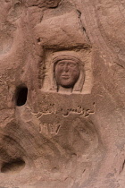 Jordan, Wadi Rum Protected Area, A stone carving depicting T.E. Lawrence, Lawrence of Arabia, on a rock near the Lawrence Spring in the Wadi Rum Protected Area, a UNESCO World Heritage Site. Dated 191...