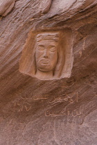 Jordan, Wadi Rum Protected Area, A stone carving depicting Prince Faisal I bin Hussein bin Ali al-Hashemi, who fought with T.E. Lawrence, Lawrence of Arabia, in the Arab Revolt against the Ottoman Tur...