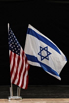 Israel, Netanya, An Israeli and a U.S. flag displayed together as a symbol of friendship and international cooperation between the two countries.