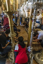 Israel, Jerusalem, The entrance to the Church of the Holy Sepulchre in the Christian Quarter of the Old City of Jerusalem contains the Stone of Annointing. The Old City of Jerusalem and its Walls is a...