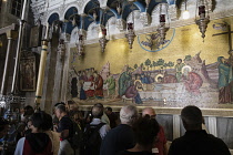 Israel, Jerusalem, A modern icon in the entrance of the Church of the Holy Sepulchre in the Christian Quarter. The Old City of Jerusalem and its Walls is a UNESCO World Heritage Site. This church was...