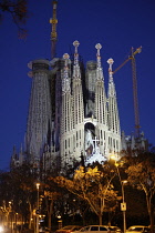 Spain, Catalonia, Barcelona, Sagrada Familia exterior, Night time view of Passion facade and towers.