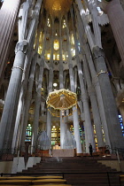 Spain, Catalonia, Barcelona, Interior of the Sagrada Familia designed by Antoni Gaudi, Apse, Altar, Baldachin canopy.