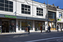 England, East Sussex, Brighton, People in queue with social distancing measures put in place by Waitrose supermarket to limit people entering the store.