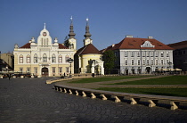 Romania, Timis, Timisoara, West flank of Piata Uniri with Serbian Orthodox church, Bishop's house and merchant house, old town.