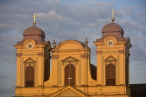 Romania, Timis, Timisoara, Catholic Cathedral on Piata Uniri at sunset, old town.