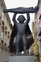 Romania, Timis, Timisoara, Supermam by Virgil Scripcaru, bronze sculpture, street art, old townl.