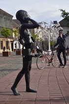 Romania, Timis, Timisoara, D-A-Telefonul' (Playing the Telephone) by Bogdan Rata, bronze sculpture, street art, Piata Libertatii, old townl.