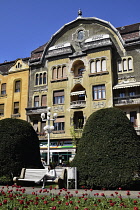 Romania, Timis, Timisoara, Secession buildings on Piata Victoriei with gardens, old town.