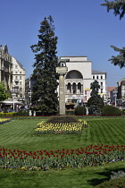 Romania, Timis, Timisoara, View through gardens to Opera House, Piata Victoriei, old town.