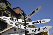 Romania, Timis, Timisoara, European City of Culture road signs, Piata Victoriei, old town.