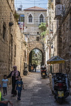 Israel, Jerusalem, A gateway on a street in the Muslim Quarter of the Old City of Jerusalem. The Old City and its Walls is a UNESCO World Heritage Site.