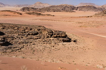 Jordan, Wadi Rum Protected Area, Desert sand and mountains in the Wadi Rum Protected Area, a UNESCO World Heritage Site. Um Sahn sandstone.