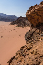 Jordan, Wadi Rum Protected Area, Desert sand and mountains in the Wadi Rum Protected Area, a UNESCO World Heritage Site. Um Sahn sandstone.