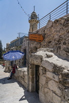 Palestine, Bethany, Occupied West Bank, The entrance to Lazarus' Tomb in Bethany in the Occupied West Bank. Behind is the minaret of the al-Uzair Mosque.
