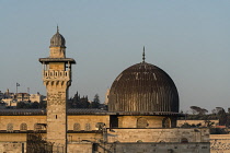 Israel, Jerusalem, The al-Aqsa Mosque and the al-Fakhariyya Minaret on the Temple Mount or al-Haram ash-Sharif at sunset in the Old City. The Old City of Jerusalem and its Walls is a UNESCO World Heri...