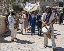 Israel, Jerusalem, Jewish Quarter, Musicians lead the procession before a bar mitzvah ceremony in the Jewish Quarter of the Old City. The Old City of Jerusalem and its Walls is a UNESCO World Heritage...