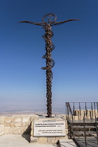 Jordan, Mount Nebo, Mount Nebo, The Brazen Serpent Monument is a sculpture representing the brass serpent lifted up by Moses and the cross upon which Christ was crucified. It was created by Italian ar...