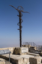 Jordan, Mount Nebo, Mount Nebo, The Brazen Serpent Monument is a sculpture representing the brass serpent lifted up by Moses and the cross upon which Christ was crucified. It was created by Italian ar...