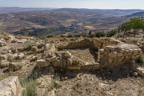 Jordan, Mount Nebo, Mount Nebo, Ruins of the Byzantine-era Siyagha monastery located by the Memorial Church of Moses. Behind is Wadi 'Uyun Musa and Moses' Spring.
