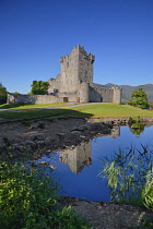 Ireland, County Kerry, Killarney, Ross Castle with its reflection in Lough Leane.