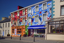 Ireland, County Clare, Lisdoonvarna, Colourful romance based artwork surrounding the Matchmaker Bar relating to the towns annual Matchmaker festival held every September.