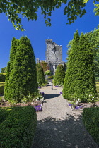 Ireland, County Clare, Quin, Knappogue Castle seen from the walled Rose Garden.