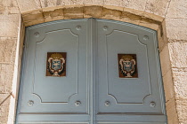 Israel, Jerusalem, The crest with the Franciscan seal on the doors of the Convent of the Sisters of Zion in the Muslim Quarter of the Old City of Jerusalem. The Old City and its Walls is a UNESCO Worl...