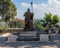 Israel, Capernaum, A statue of the Apostle Peter in the ruins of his home town, the Biblical town of Capernaum on the shore of the Sea of Galillee in Israel.