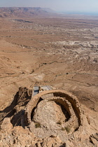 Israel, The middle terrace of the Herod's Northern Palace at Masada contained a circular reception hall with a pointed roof supported by columns. Ruins of the fortress of Masada in the Judean Desert o...