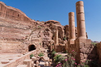 Jordan, Petra, Stone columns in front of the theater on the Street of Facades in the Nabataean city of Petra in the Petra Archeological Park is a Jordanian National Park and a UNESCO World Heritage Si...