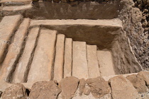 Palestine, Qumram National Park, A mikveh or Jewish ritual bath in the ruins of Qumram in Qumram National Park near the Dead Sea in the Occupied Territory of the West Bank. The Dead Sea Scrolls were d...