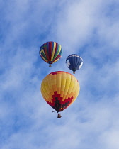 USA, Arizona, Monument Valley, Hot air balloons during Balloon Festival fly over the Navajo Tribal  Park.